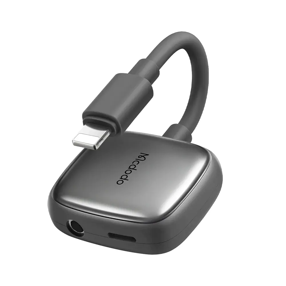 Mcdodo CA-2742 Dual Lightning Adapter — Charge Plus 3.5 mm Audio